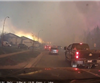 加拿大野火迫10万人疏散，车拍视频天降火雨如同地狱